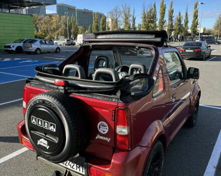 Сузуки Джимни 2006 в Киеве на Automoto.ua Красный Сузуки Джимни, объемом двигателя 1.5 л и пробегом 221 тыс. км за 12000 $, фото 9 на Automoto.ua