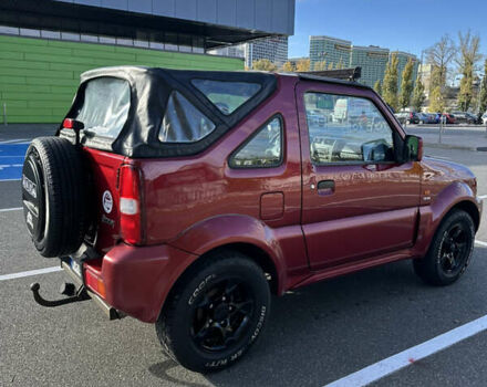 Сузуки Джимни 2006 в Киеве на Automoto.ua Красный Сузуки Джимни, объемом двигателя 1.5 л и пробегом 221 тыс. км за 12000 $, фото 4 на Automoto.ua