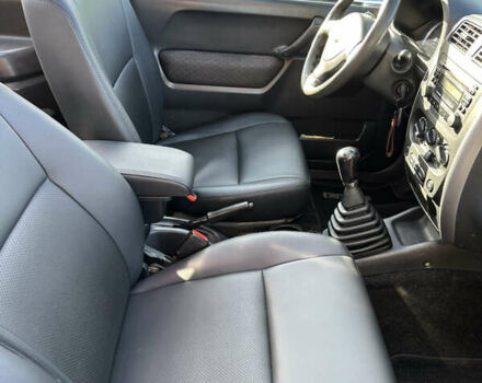 Сузуки Джимни 2006 в Киеве на Automoto.ua Красный Сузуки Джимни, объемом двигателя 1.5 л и пробегом 221 тыс. км за 12000 $, фото 13 на Automoto.ua