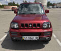 Красный Сузуки Джимни, объемом двигателя 1.33 л и пробегом 134 тыс. км за 9200 $, фото 2 на Automoto.ua