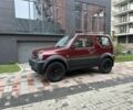 Красный Сузуки Джимни, объемом двигателя 1.3 л и пробегом 174 тыс. км за 8500 $, фото 1 на Automoto.ua