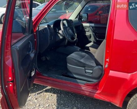Сузуки Джимни 2008 в Ужгороде на Automoto.ua Красный Сузуки Джимни, объемом двигателя 1.3 л и пробегом 190 тыс. км за 7990 $, фото 8 на Automoto.ua