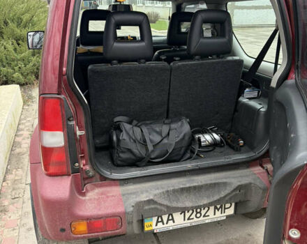 Червоний Сузукі Джімні, об'ємом двигуна 1.33 л та пробігом 114 тис. км за 9500 $, фото 7 на Automoto.ua