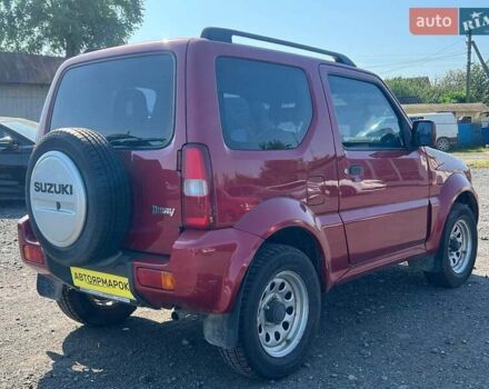 Сузуки Джимни 2008 в Ужгороде на Automoto.ua Красный Сузуки Джимни, объемом двигателя 1.3 л и пробегом 190 тыс. км за 7990 $, фото 5 на Automoto.ua