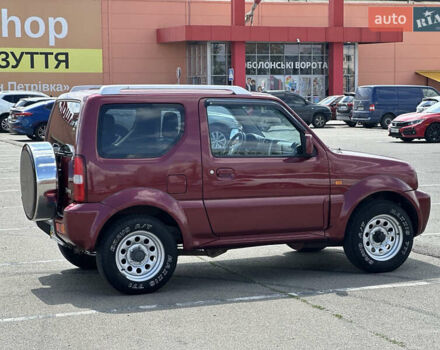 Красный Сузуки Джимни, объемом двигателя 1.33 л и пробегом 134 тыс. км за 9200 $, фото 1 на Automoto.ua