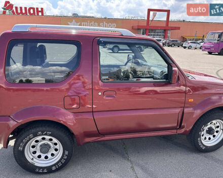 Красный Сузуки Джимни, объемом двигателя 1.33 л и пробегом 134 тыс. км за 9200 $, фото 5 на Automoto.ua