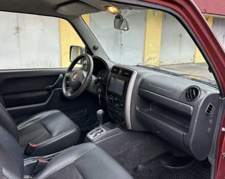 Красный Сузуки Джимни, объемом двигателя 1.3 л и пробегом 174 тыс. км за 8500 $, фото 23 на Automoto.ua