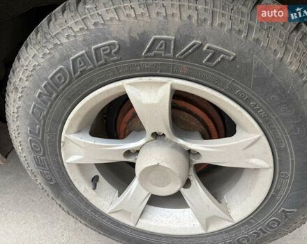 Червоний Сузукі Джімні, об'ємом двигуна 1.33 л та пробігом 114 тис. км за 9500 $, фото 6 на Automoto.ua