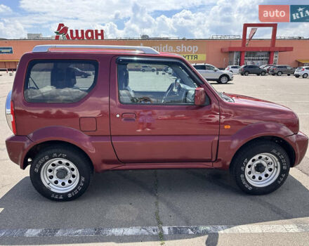 Красный Сузуки Джимни, объемом двигателя 1.33 л и пробегом 134 тыс. км за 9200 $, фото 3 на Automoto.ua