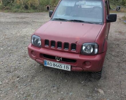 Красный Сузуки Джимни, объемом двигателя 1.3 л и пробегом 185 тыс. км за 5999 $, фото 1 на Automoto.ua