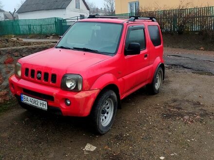 Красный Сузуки Джимни, объемом двигателя 1.3 л и пробегом 198 тыс. км за 7900 $, фото 1 на Automoto.ua
