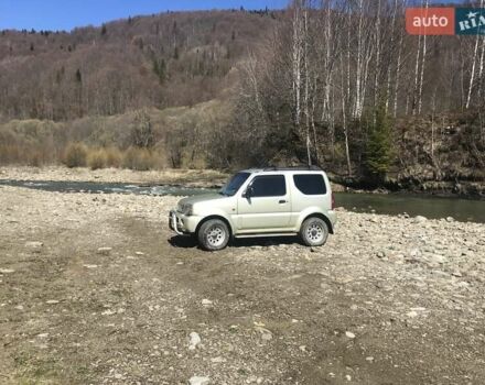 Желтый Сузуки Джимни, объемом двигателя 1.3 л и пробегом 170 тыс. км за 6800 $, фото 1 на Automoto.ua