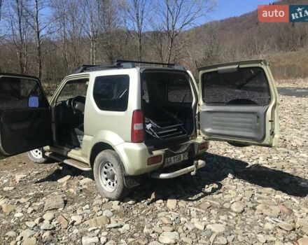 Желтый Сузуки Джимни, объемом двигателя 1.3 л и пробегом 170 тыс. км за 6800 $, фото 2 на Automoto.ua