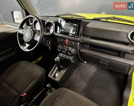 Желтый Сузуки Джимни, объемом двигателя 1.5 л и пробегом 149 тыс. км за 17900 $, фото 48 на Automoto.ua