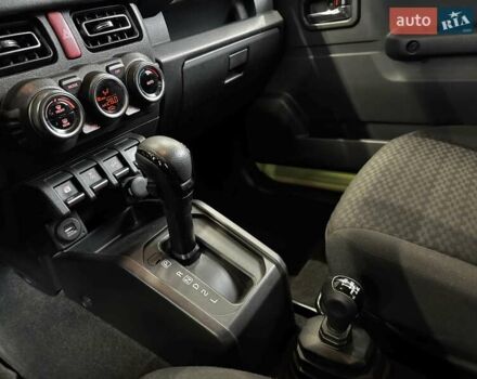 Желтый Сузуки Джимни, объемом двигателя 1.5 л и пробегом 149 тыс. км за 17900 $, фото 52 на Automoto.ua