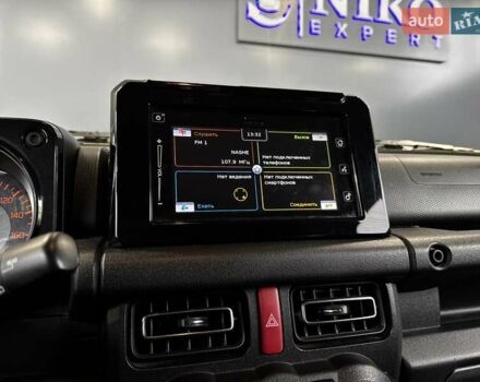 Желтый Сузуки Джимни, объемом двигателя 1.5 л и пробегом 149 тыс. км за 17900 $, фото 51 на Automoto.ua