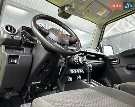 Желтый Сузуки Джимни, объемом двигателя 1.5 л и пробегом 149 тыс. км за 17900 $, фото 46 на Automoto.ua