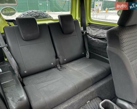 Желтый Сузуки Джимни, объемом двигателя 1.46 л и пробегом 62 тыс. км за 23300 $, фото 17 на Automoto.ua