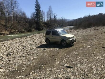 Желтый Сузуки Джимни, объемом двигателя 1.3 л и пробегом 170 тыс. км за 6800 $, фото 1 на Automoto.ua
