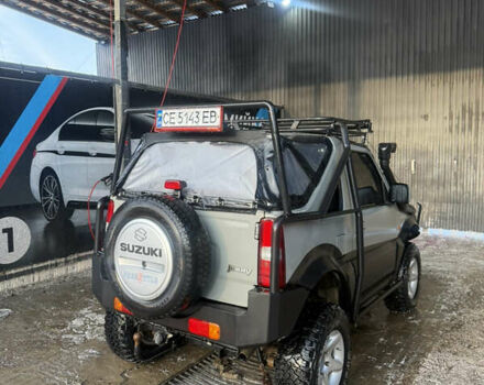 Сірий Сузукі Джімні, об'ємом двигуна 1.46 л та пробігом 117 тис. км за 12000 $, фото 4 на Automoto.ua