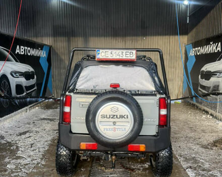 Сірий Сузукі Джімні, об'ємом двигуна 1.46 л та пробігом 117 тис. км за 12000 $, фото 5 на Automoto.ua