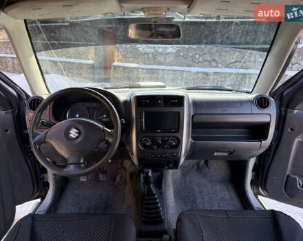 Сірий Сузукі Джімні, об'ємом двигуна 1.46 л та пробігом 117 тис. км за 12000 $, фото 11 на Automoto.ua