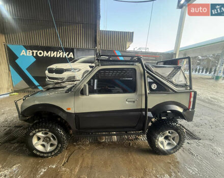 Сірий Сузукі Джімні, об'ємом двигуна 1.46 л та пробігом 117 тис. км за 12000 $, фото 8 на Automoto.ua