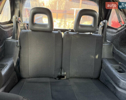 Сірий Сузукі Джімні, об'ємом двигуна 1.46 л та пробігом 117 тис. км за 12000 $, фото 13 на Automoto.ua