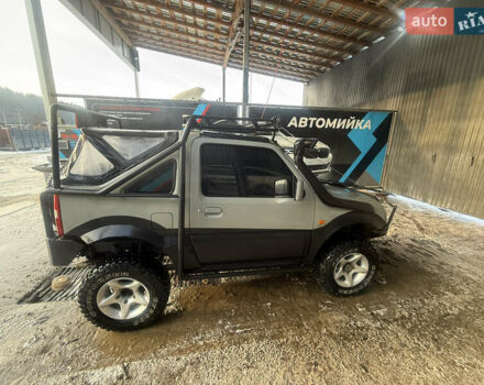 Сірий Сузукі Джімні, об'ємом двигуна 1.46 л та пробігом 117 тис. км за 12000 $, фото 3 на Automoto.ua