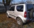 Серый Сузуки Джимни, объемом двигателя 1.3 л и пробегом 73 тыс. км за 274 $, фото 2 на Automoto.ua
