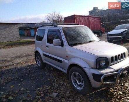 Серый Сузуки Джимни, объемом двигателя 1.3 л и пробегом 73 тыс. км за 11500 $, фото 6 на Automoto.ua