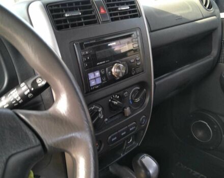 Серый Сузуки Джимни, объемом двигателя 1.3 л и пробегом 73 тыс. км за 274 $, фото 5 на Automoto.ua