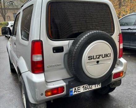Серый Сузуки Джимни, объемом двигателя 1.33 л и пробегом 121 тыс. км за 8800 $, фото 4 на Automoto.ua