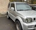 Серый Сузуки Джимни, объемом двигателя 1.33 л и пробегом 121 тыс. км за 8800 $, фото 3 на Automoto.ua