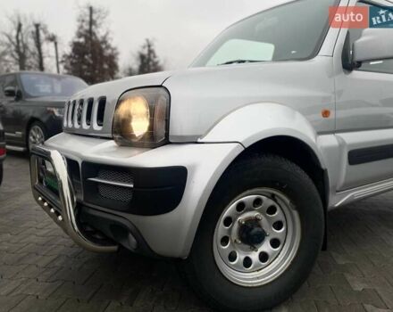 Серый Сузуки Джимни, объемом двигателя 1.33 л и пробегом 83 тыс. км за 11490 $, фото 4 на Automoto.ua