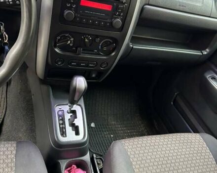 Серый Сузуки Джимни, объемом двигателя 1.33 л и пробегом 121 тыс. км за 8800 $, фото 1 на Automoto.ua