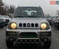 Серый Сузуки Джимни, объемом двигателя 1.33 л и пробегом 83 тыс. км за 11490 $, фото 3 на Automoto.ua