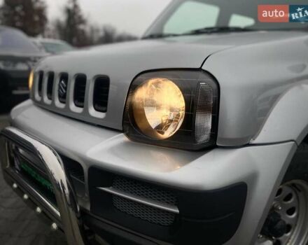 Серый Сузуки Джимни, объемом двигателя 1.33 л и пробегом 83 тыс. км за 11490 $, фото 1 на Automoto.ua