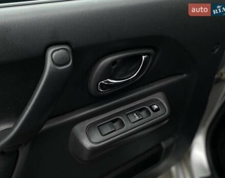 Серый Сузуки Джимни, объемом двигателя 1.33 л и пробегом 83 тыс. км за 11490 $, фото 21 на Automoto.ua