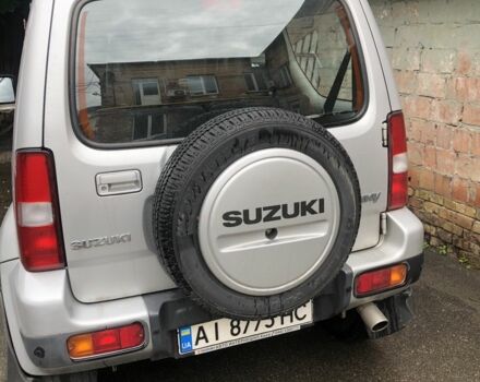 Сірий Сузукі Джімні, об'ємом двигуна 1.3 л та пробігом 83 тис. км за 11000 $, фото 4 на Automoto.ua