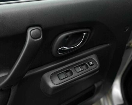 Серый Сузуки Джимни, объемом двигателя 1.3 л и пробегом 83 тыс. км за 11490 $, фото 11 на Automoto.ua