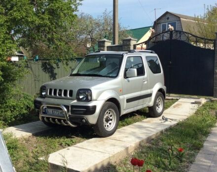 Сірий Сузукі Джімні, об'ємом двигуна 1.3 л та пробігом 83 тис. км за 11000 $, фото 7 на Automoto.ua