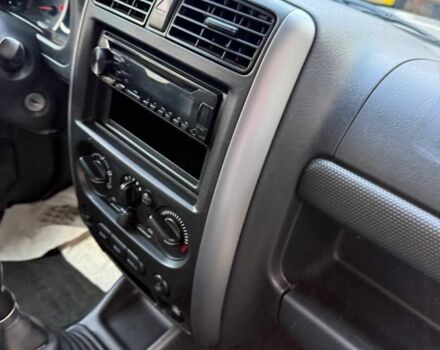 Серый Сузуки Джимни, объемом двигателя 1.3 л и пробегом 74 тыс. км за 4000 $, фото 6 на Automoto.ua