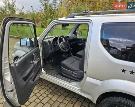 Серый Сузуки Джимни, объемом двигателя 1.33 л и пробегом 149 тыс. км за 11700 $, фото 4 на Automoto.ua