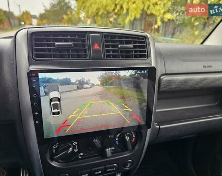 Серый Сузуки Джимни, объемом двигателя 1.33 л и пробегом 149 тыс. км за 11700 $, фото 17 на Automoto.ua