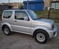 Серый Сузуки Джимни, объемом двигателя 1.3 л и пробегом 47 тыс. км за 16000 $, фото 1 на Automoto.ua