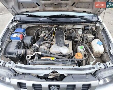 Серый Сузуки Джимни, объемом двигателя 1.3 л и пробегом 90 тыс. км за 13999 $, фото 20 на Automoto.ua