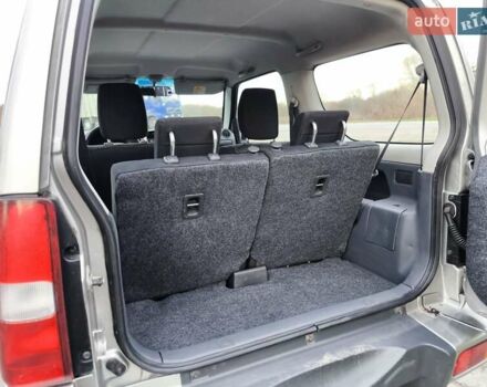 Серый Сузуки Джимни, объемом двигателя 1.3 л и пробегом 90 тыс. км за 13999 $, фото 15 на Automoto.ua