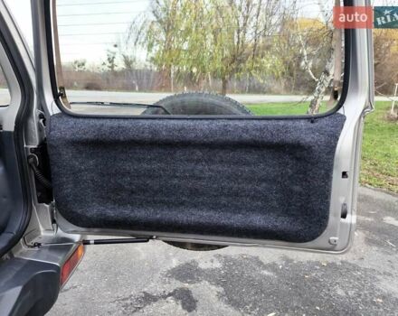 Серый Сузуки Джимни, объемом двигателя 1.33 л и пробегом 92 тыс. км за 13999 $, фото 9 на Automoto.ua