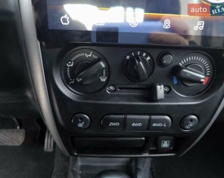 Серый Сузуки Джимни, объемом двигателя 1.33 л и пробегом 92 тыс. км за 13999 $, фото 37 на Automoto.ua